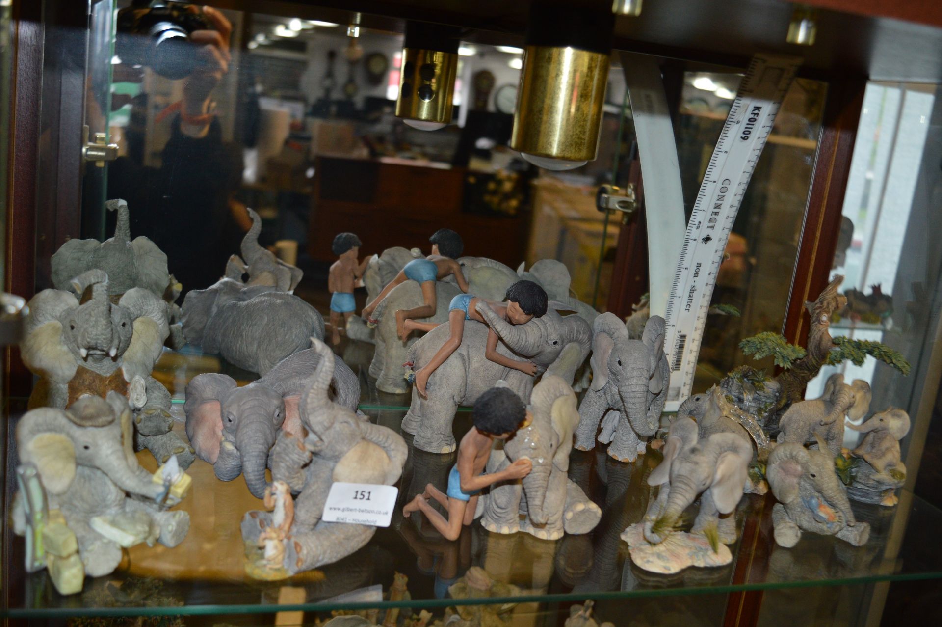Collection of Ten Tuskers Elephant Ornaments Including Two with Mowgli
