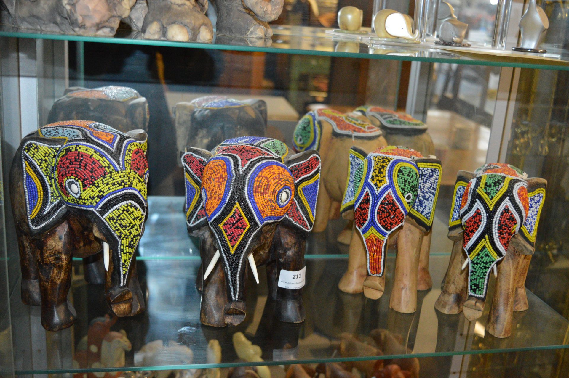 Four Carved Wooden Elephants with Beadwork