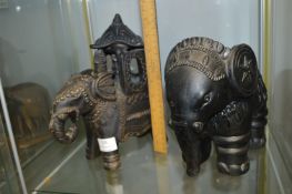Two Black Pottery Ornate Elephants