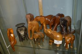 Ten Carved Wood Elephants Including Candle Holder,