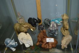 Twelve Assorted Pottery Elephants
