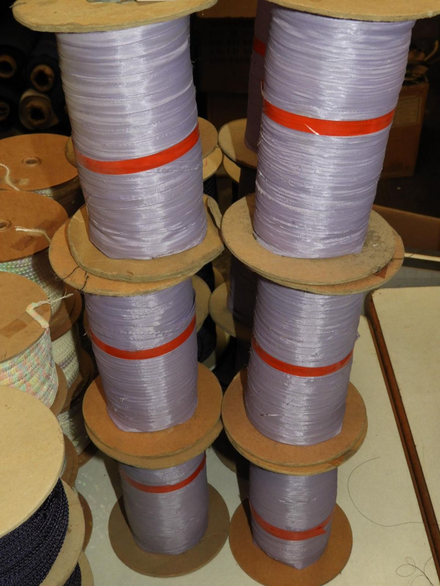 Six Rolls of Lilac Ribbon