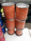 Six Rolls of Orange Braided Thread
