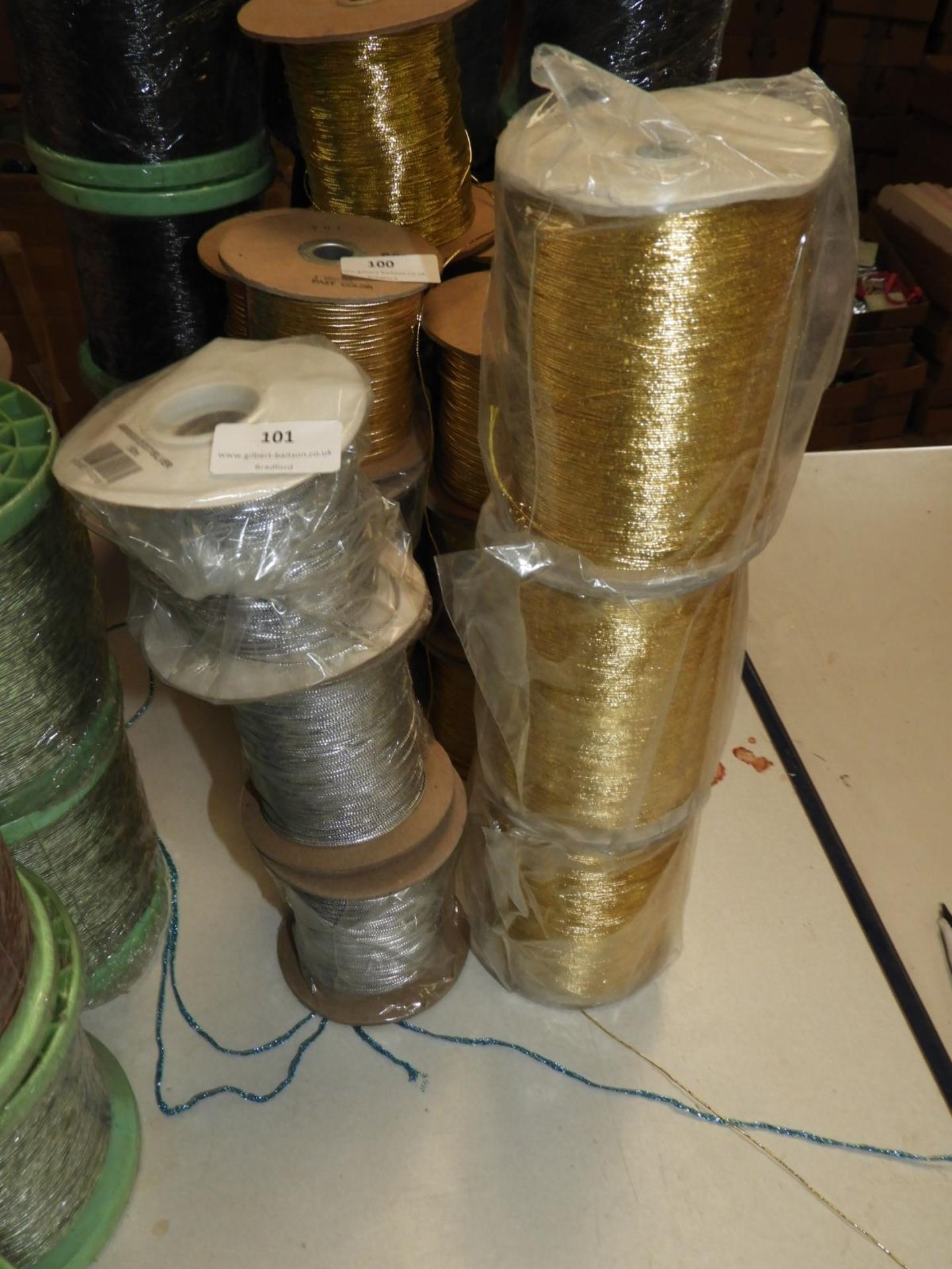 Three Rolls of Silver and Three Rolls of Gold Brai