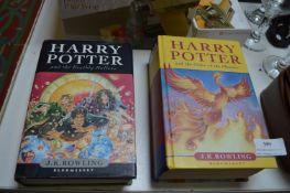Two Harry Potter First Edition Books