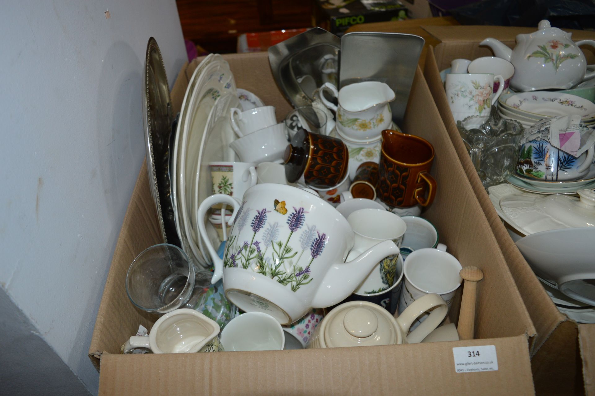 Large Assortment of Pottery; Mugs, Serving Plates,