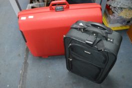 Samsonite Suitcase and a Essentials Carry On Case