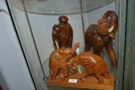 Three Carved Wood Elephants