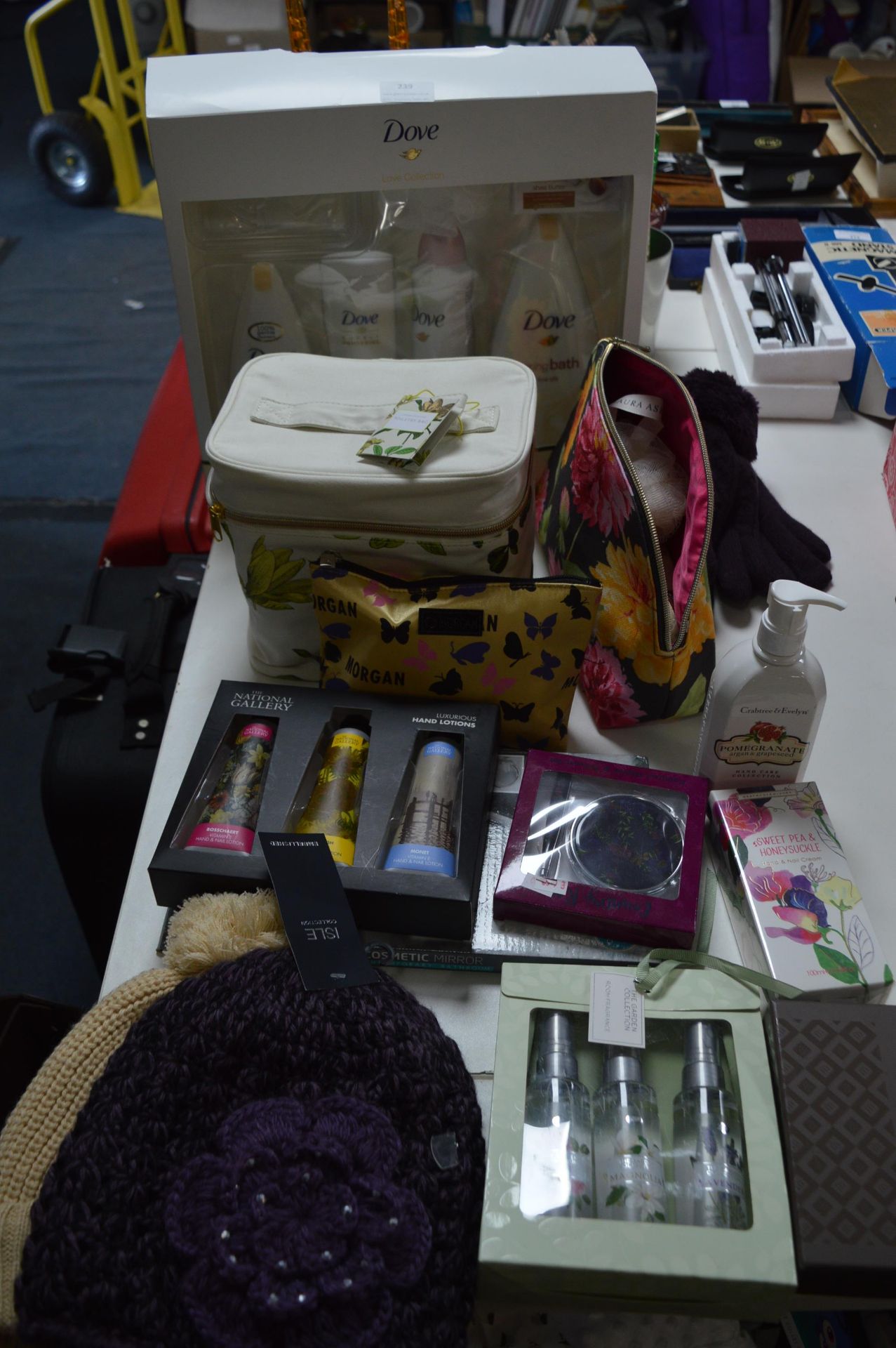 Assorted New Cosmetic Items by Dove, Laura Ashley,