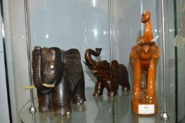 Three Carved Wood Elephants