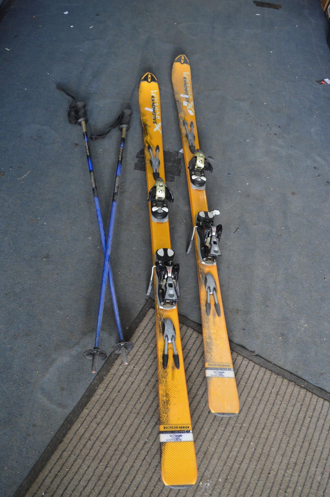 Pair of Salomon Skis and a Pair of Ski Poles