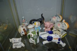 Ten Assorted Pottery Elephants
