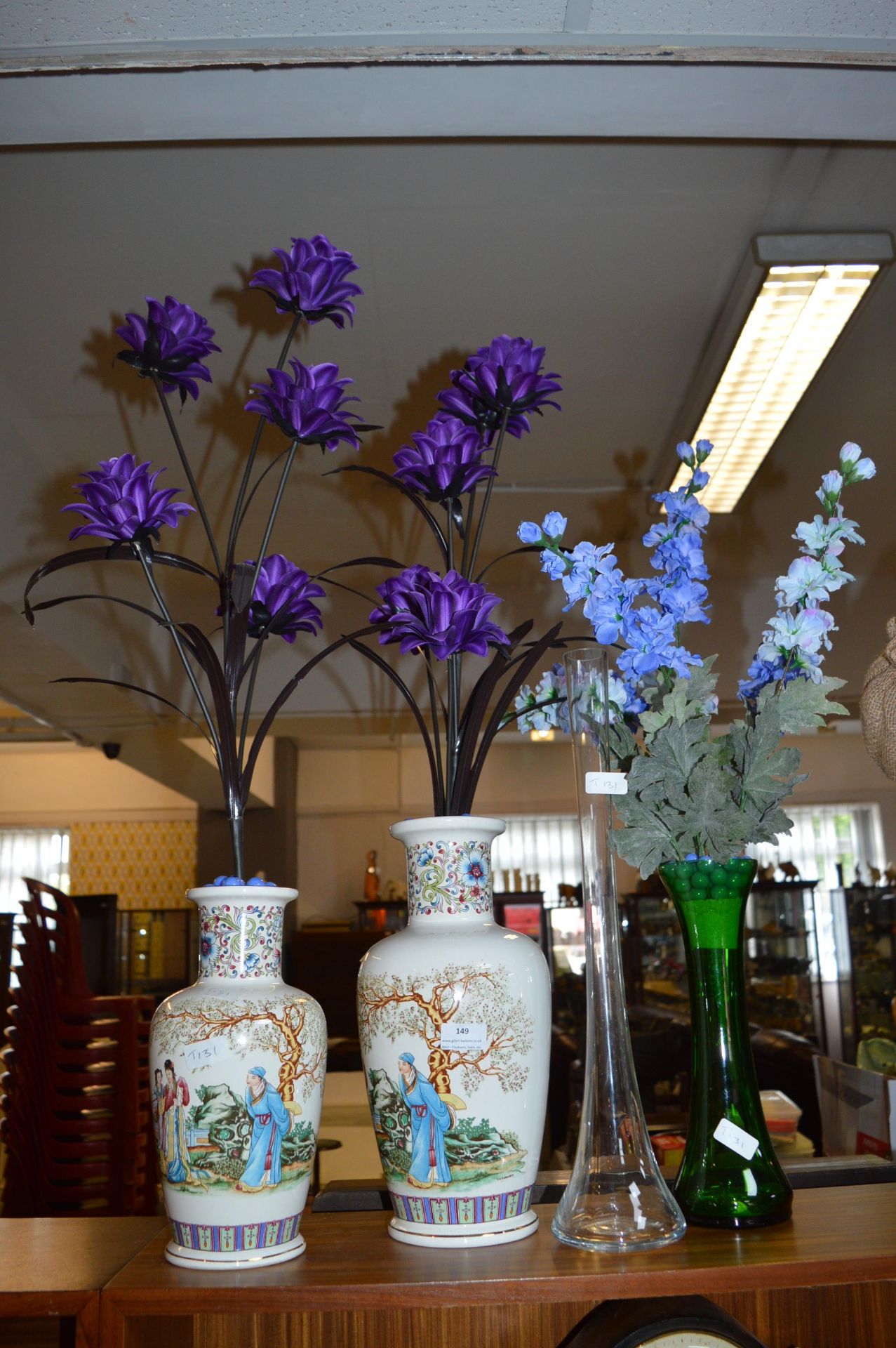 Four Vases Containing Artificial Flowers