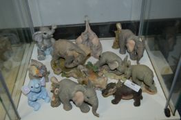 Nine Assorted Elephants Including Two Groups