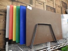 Six Coloured Chopping Boards on Stainless Steel Ra