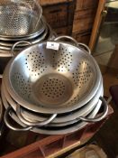 Four Stainless Steel Colanders
