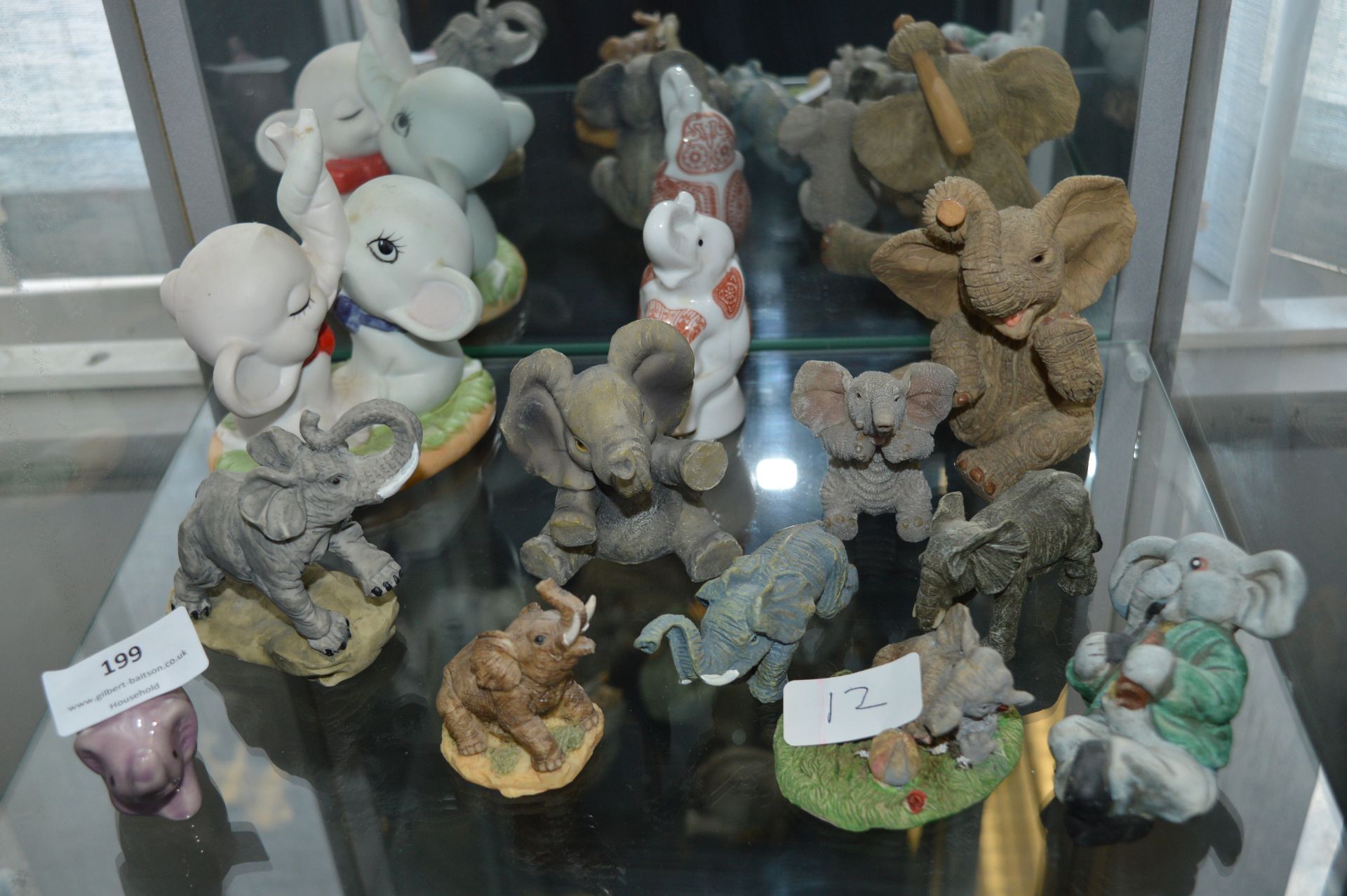 Twelve Assorted Small Elephants