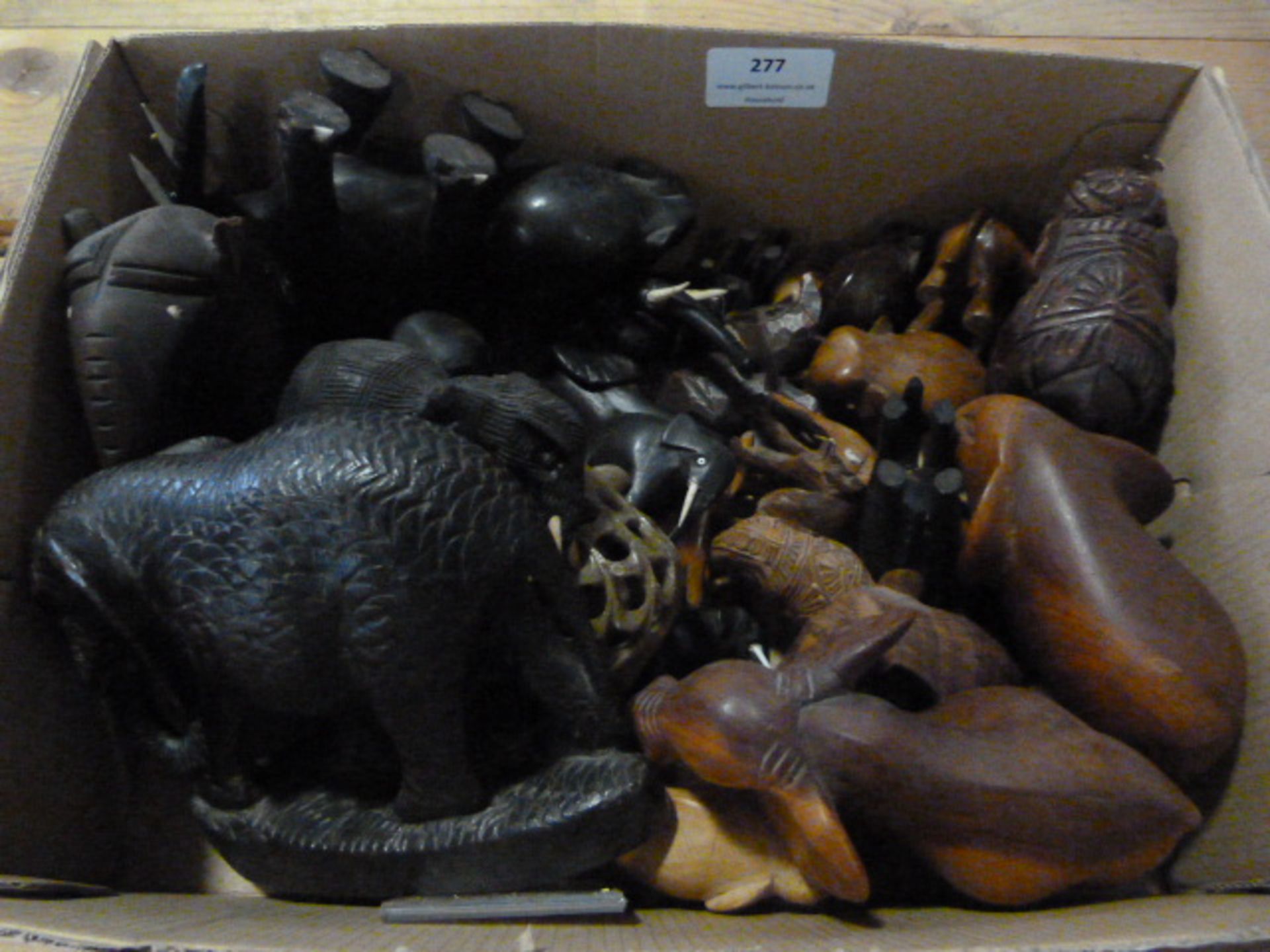 Box of Small Wooden Elephants Including Some Ebony