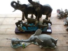 Three Elephant Groups Including Two on Bases