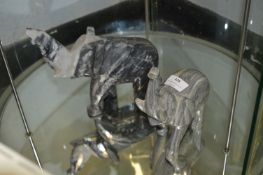 Two Carved Marble Elephants