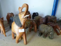 Eleven Assorted Wooden Elephants