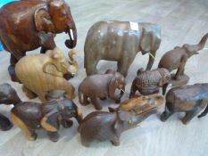 Eleven Assorted Wooden Elephants