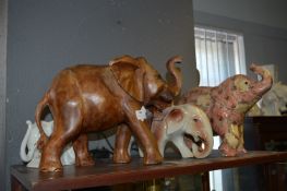 Large Carved Wood Elephants and Three Other Elepha