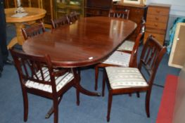 Oval Mahogany Dining Table with Eight Matching Cha