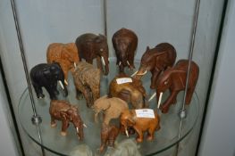 Twelve Carved Wooden Elephants