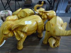 Group of Four Wooden Elephants