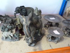 Six Resin Elephants and a Three Dishes Mounted Ele