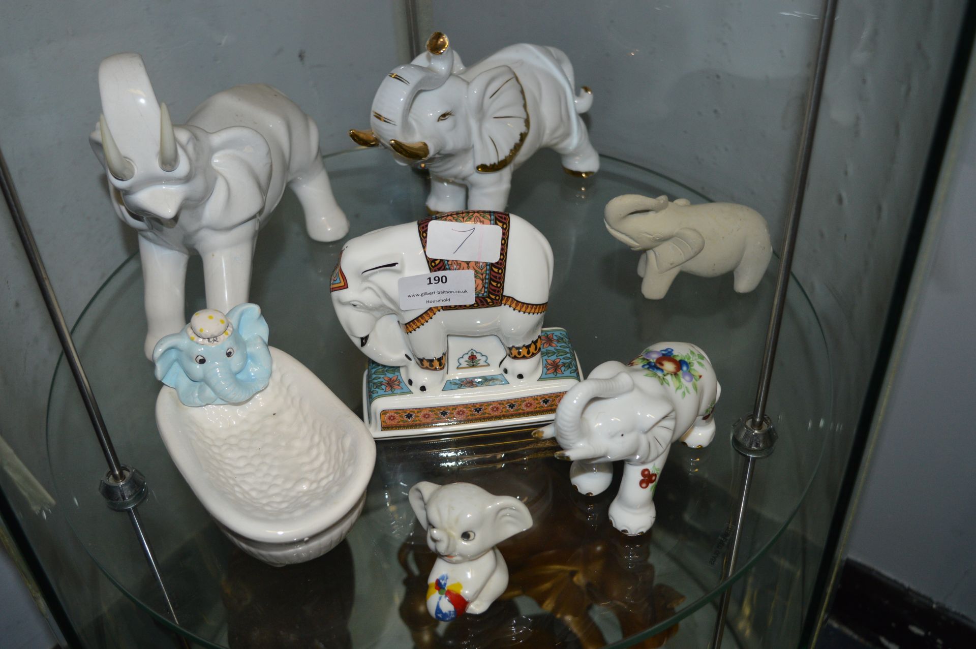 Seven Pottery Elephants Including One by Wedgwood