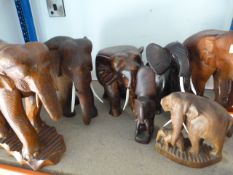 Seven Assorted Wooden Elephants