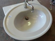 *Oval Sink with Chrome Tap