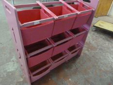 Set of Nine Pink Storage Baskets