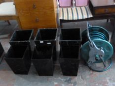 Six Planters and Hose Reel