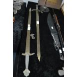 Two Ornamental Metal Swords