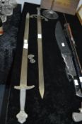 Two Ornamental Metal Swords