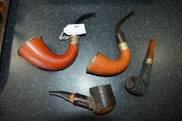 Four Smoking Pipes Some with Silver Rims