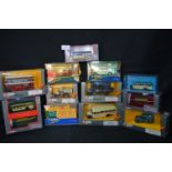 Thirteen Boxed Corgi Diecast Model Buses