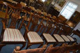Five Upholstered Dining Chairs and One Carver