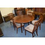 Circular Ercol Dining Table with Six Chairs