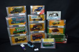 Fifteen Assorted Corgi, Matchbox and Other Diecast Advertising Vehicles, Busses, etc.
