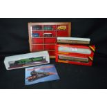 Boxed Railway Items Including Hornby, Flying Scotsman, and Model Busses in a Case