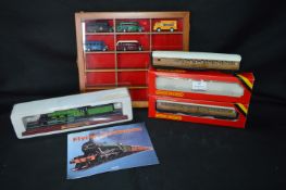 Boxed Railway Items Including Hornby, Flying Scotsman, and Model Busses in a Case
