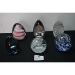 Six Glass Paperweights