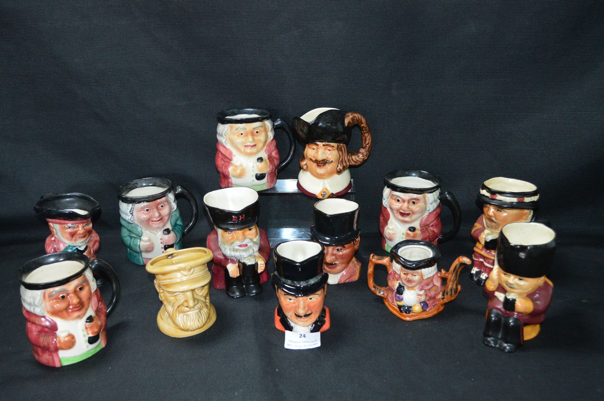 Thirteen Assorted Small Toby Jugs and Character Ju