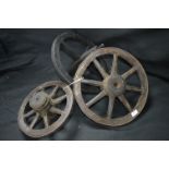 Three Vintage Wooden Barrow Wheels