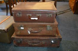 Three Vintage Leather Suitcases