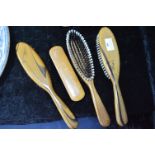 Four Vintage Clothes Brushes